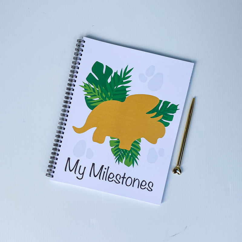 milestone pages baby book with dinosaurs