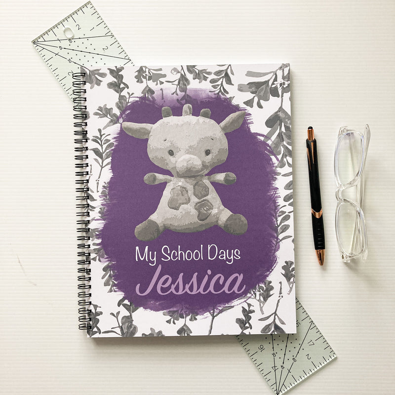 Purple school memory book with giraffe cover